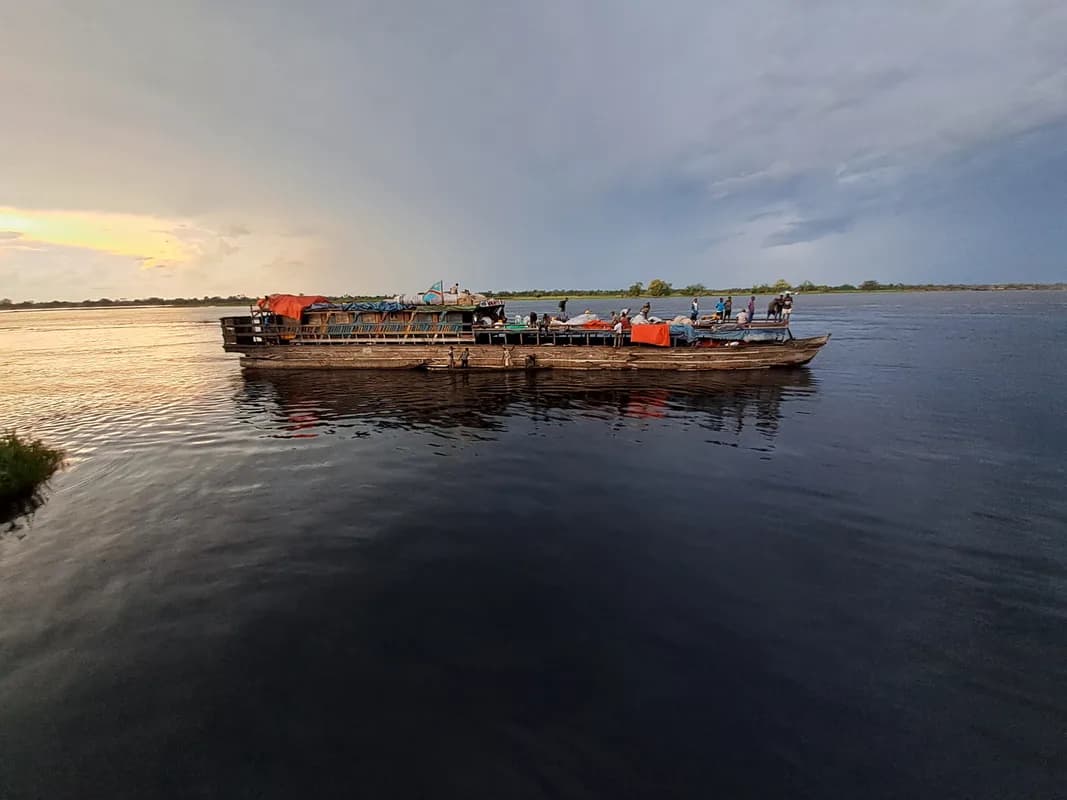 Congo River expeditions — Kinshasa departure point, riverboat travel, remote riverine landscapes
