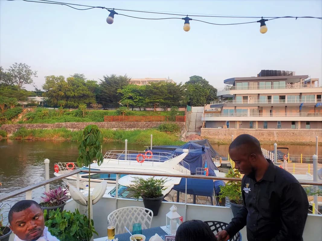 Kinshasa — Congo River boulevard, Marché Central, National Museum, rumba music and nightlife