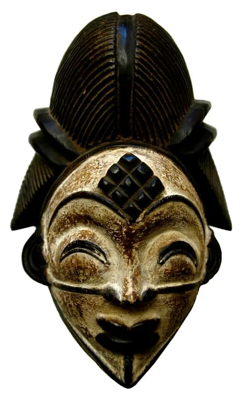 Punu mask carving workshops — mask-carving artisans